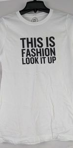 NWOT, WOMEN T-SHIRT " THIS IS FASHION LOOK IT UP'.